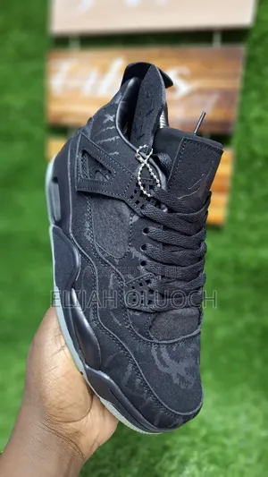Jordan 4 Kaws "Black"