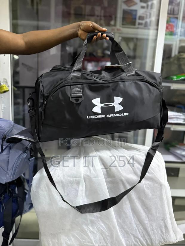 Under Armour Duffle Bag
✅ Spacious Design With Separate Shoe - main view