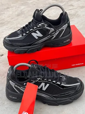 Black Unisex New Balance 509 Shoes