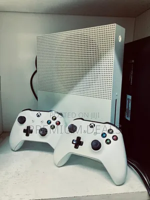 Original Xbox One S With Two Controllers and Games.