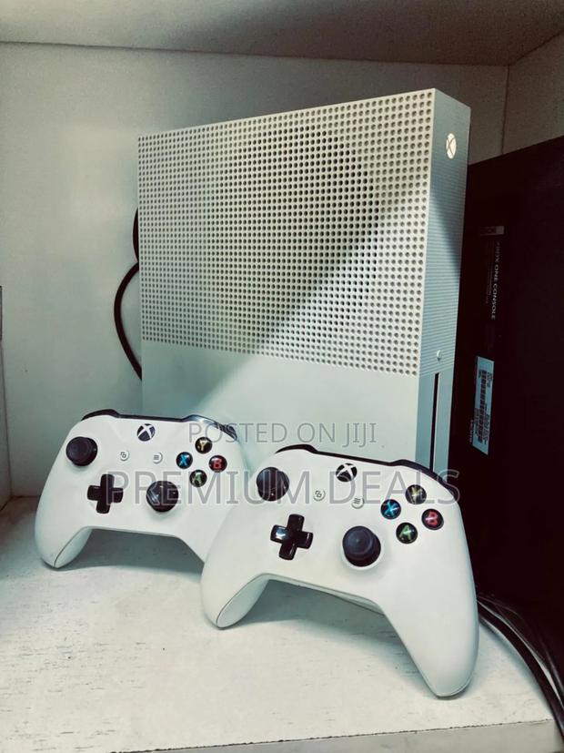 Original Xbox One S With Two Controllers and Games.