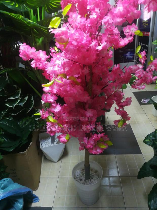 Realistic Pink Blossom and Lush Green Plant - main view