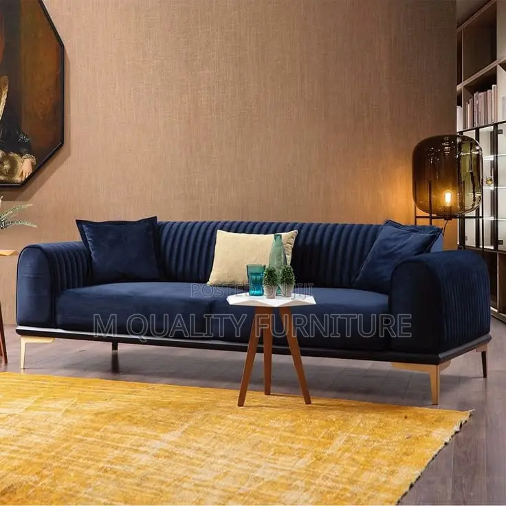 This Sofa Is Drenched in a Luxurious Royal Blue Velvet Fabri