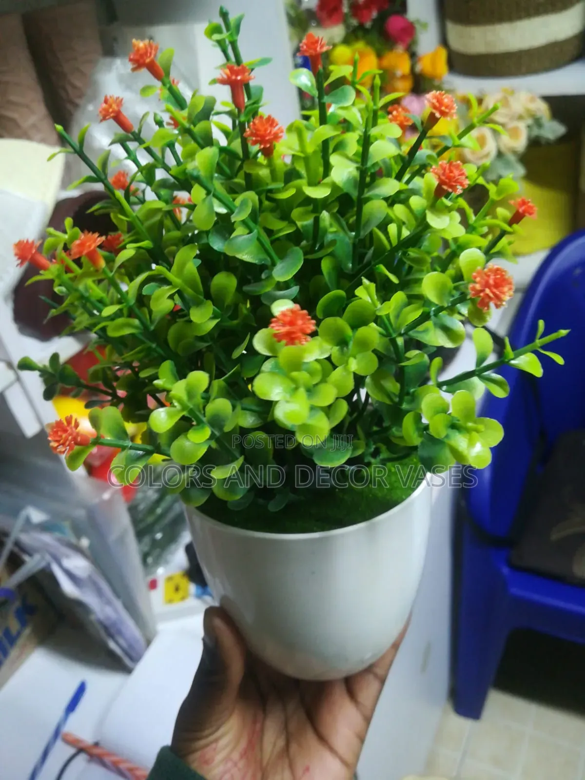 Small Flowery Plastic Vase With Flowers