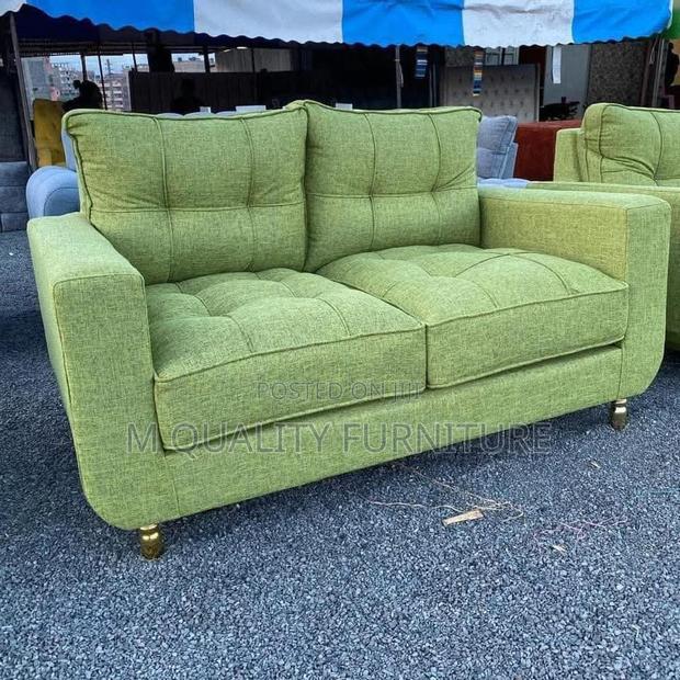 A Green Sofa Offering a Standout Silhouette