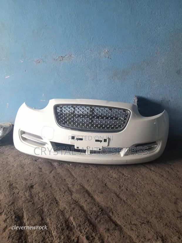 Sporty 2011 Nissan March Front Bumper - main view