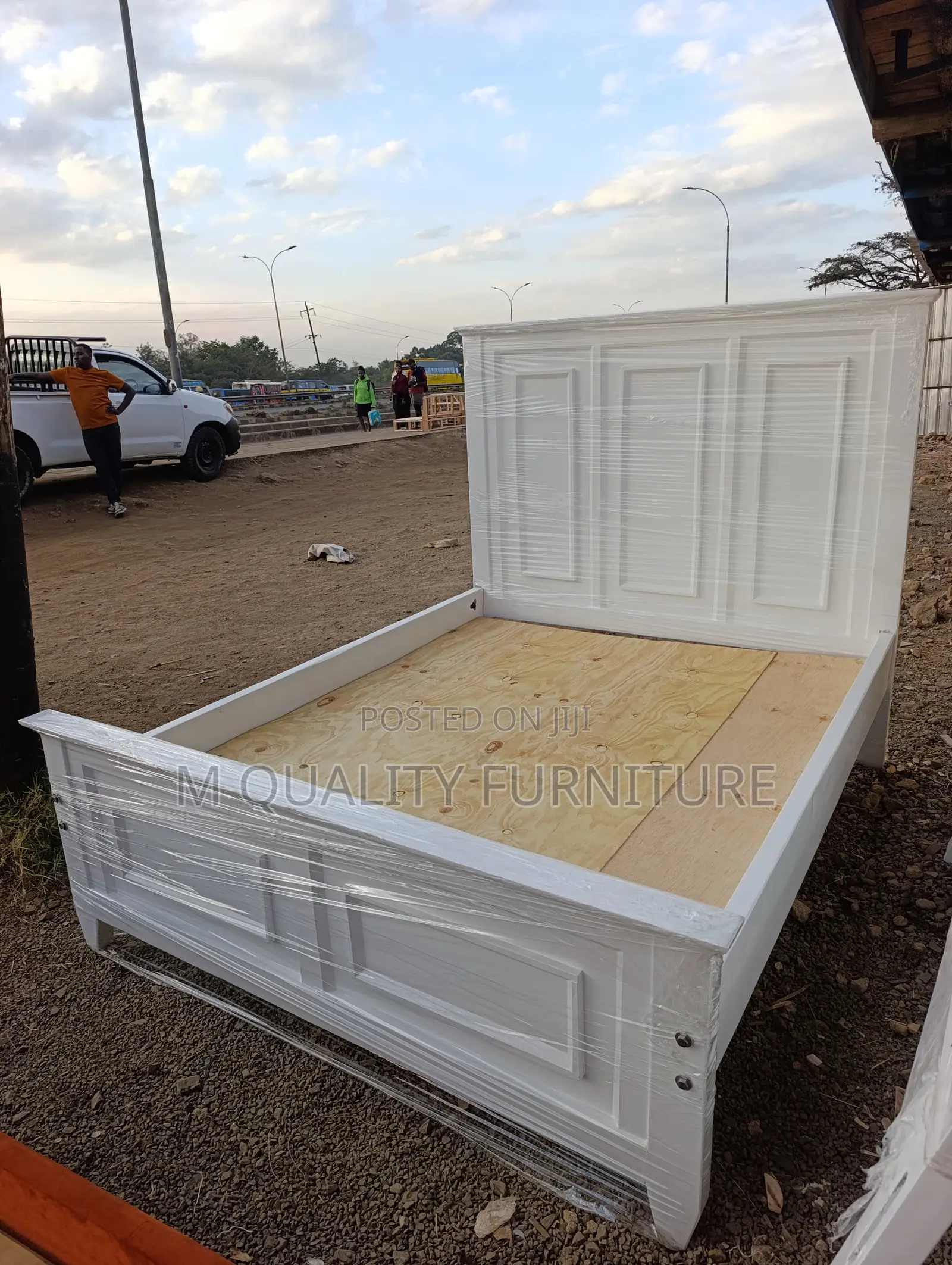 Sleek Haven White Wooden Bed