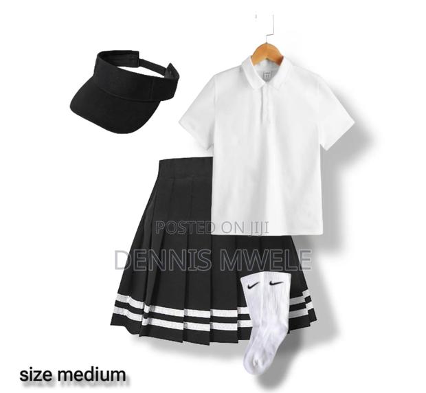 Trendy Nike-Inspired Polo, Pleated Skirt, Visor Socks