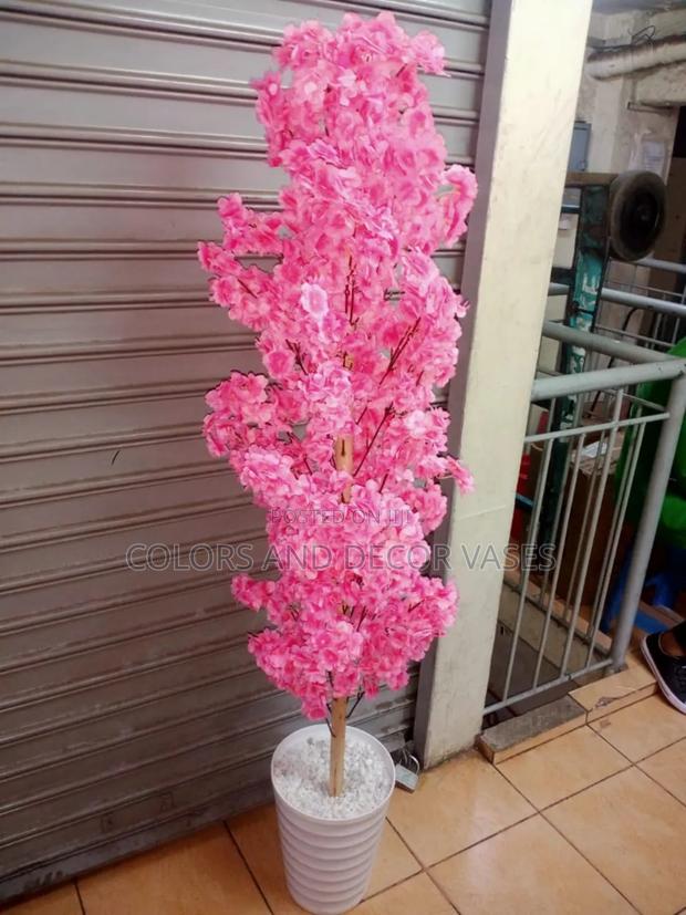Pink Blossom With Vase and Pebble Stones