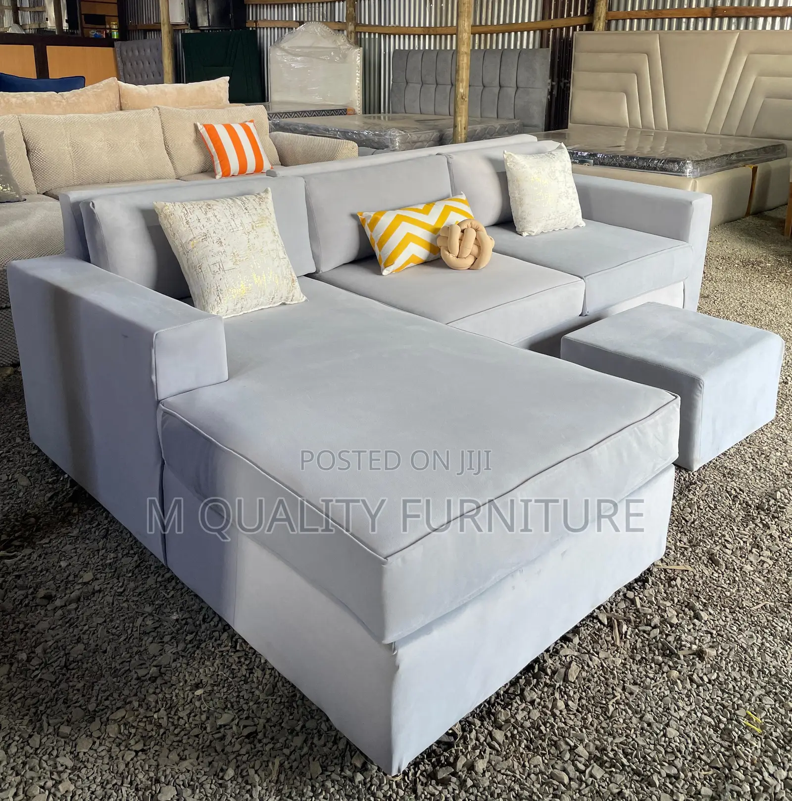 White Beautifully Designed L Sofa With Ottoman