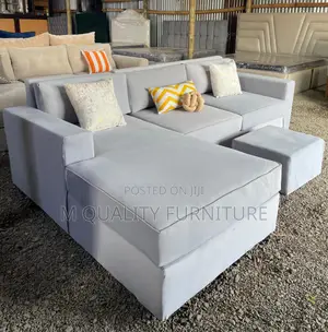 White Beautifully Designed L Sofa With Ottoman