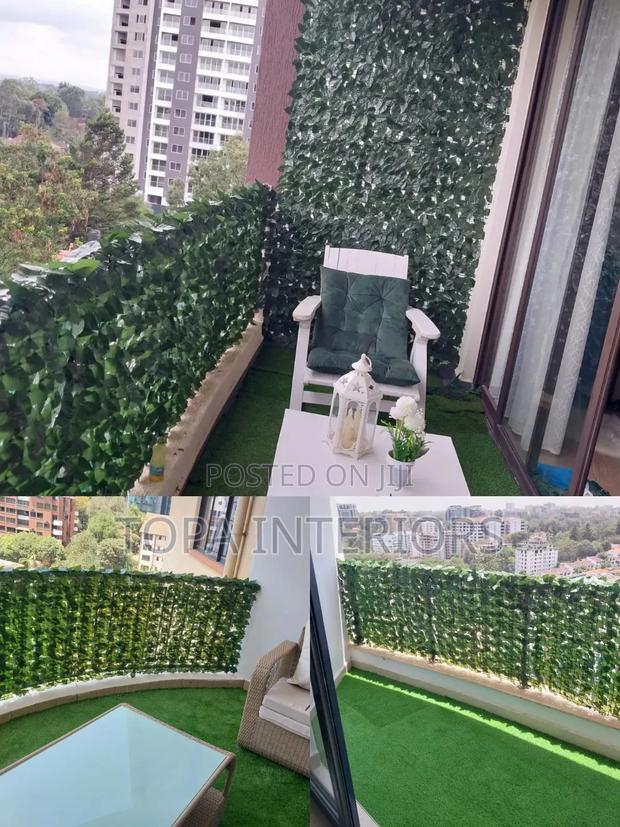 Enhance Balcony Privacy With Artificial Green Privacy Hedges