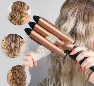 Hair Curler With Triple Barrel Iron.