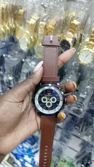 Men's Wristwatch, a Brown Leather Strap.