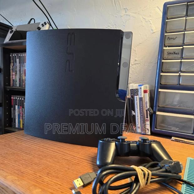 Black Preowned Ps3 With Games.