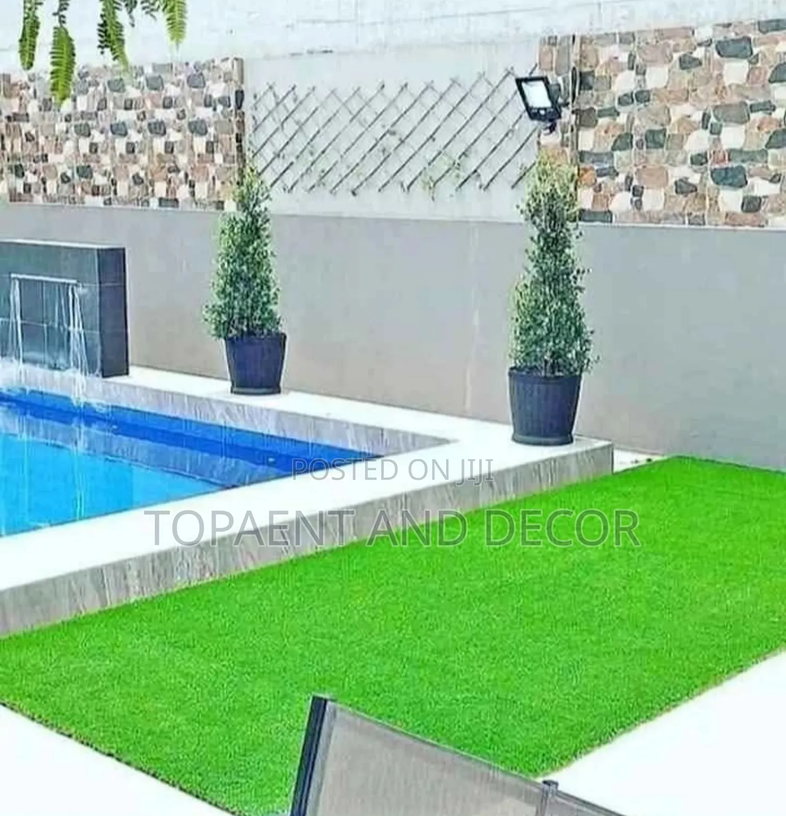 Swimming Pool Side Decorated With Artificial Grass Carpet