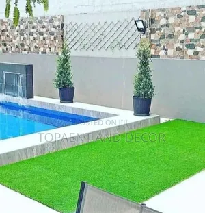 Swimming Pool Side Decorated With Artificial Grass Carpet