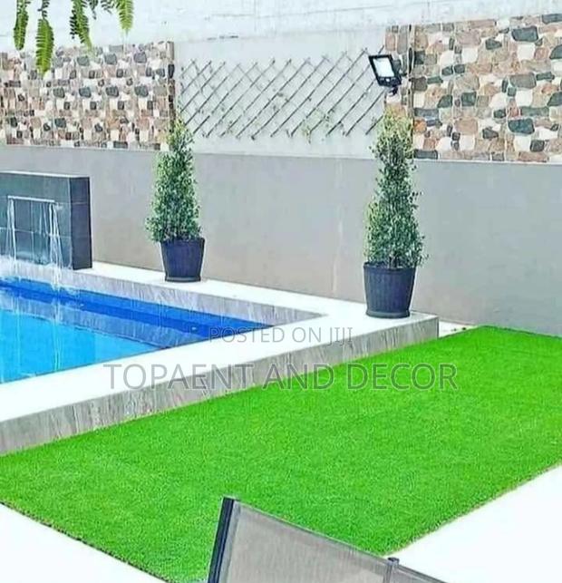 Swimming Pool Side Decorated With Artificial Grass Carpet