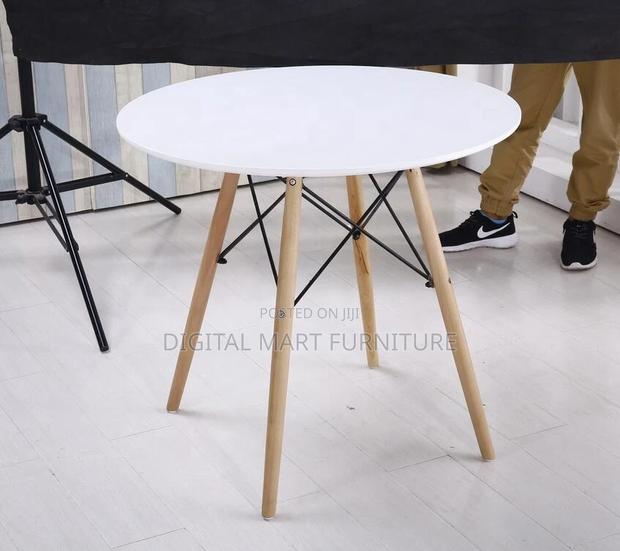 Dining Table: Polished Round Dining Table