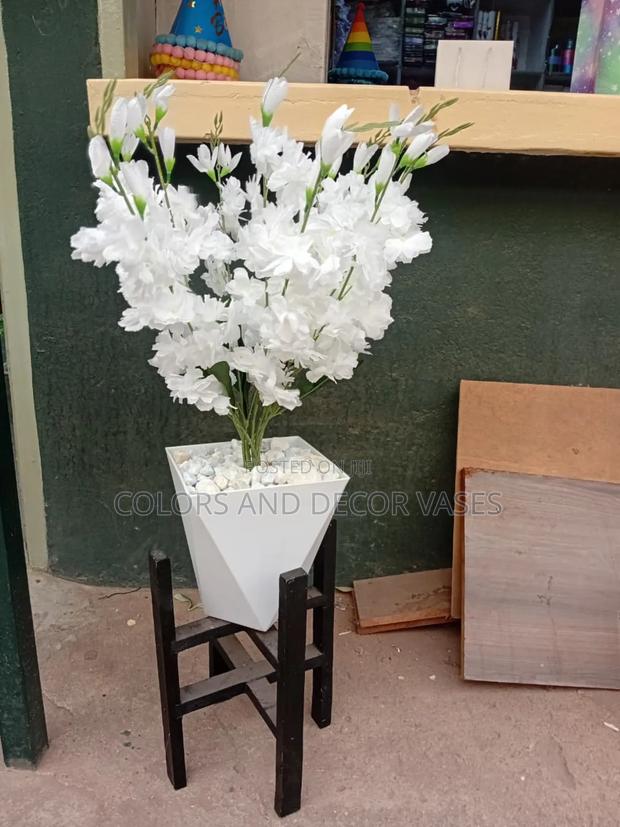 White Beautiful Flowers on Stool