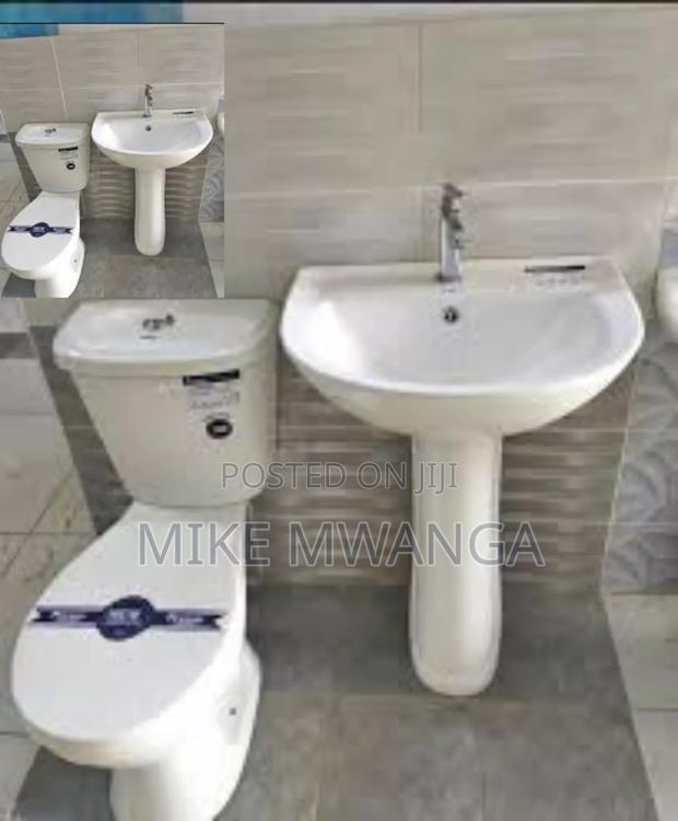 Bathroom Close Couple Toilet Seat