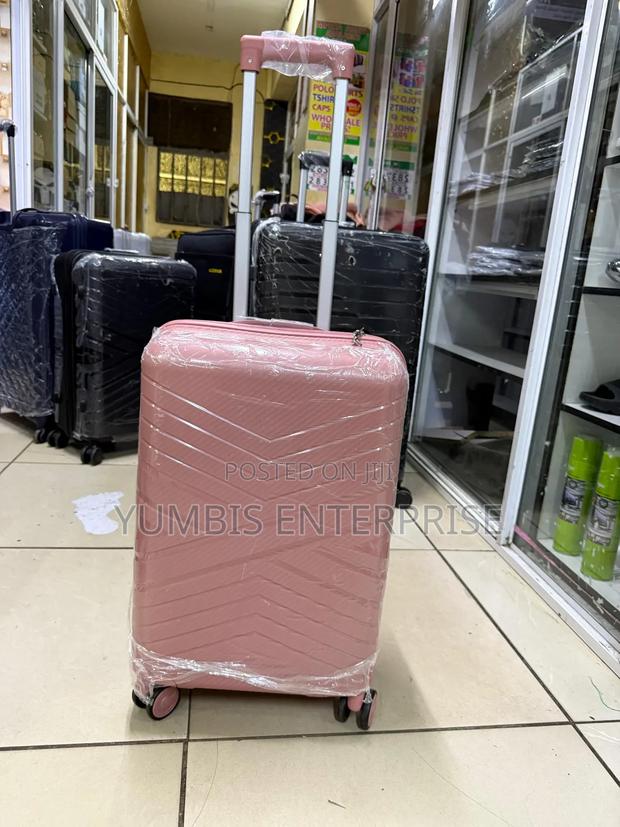 Small Size Suitcase in Pink Ish Colors - thumbnail 2