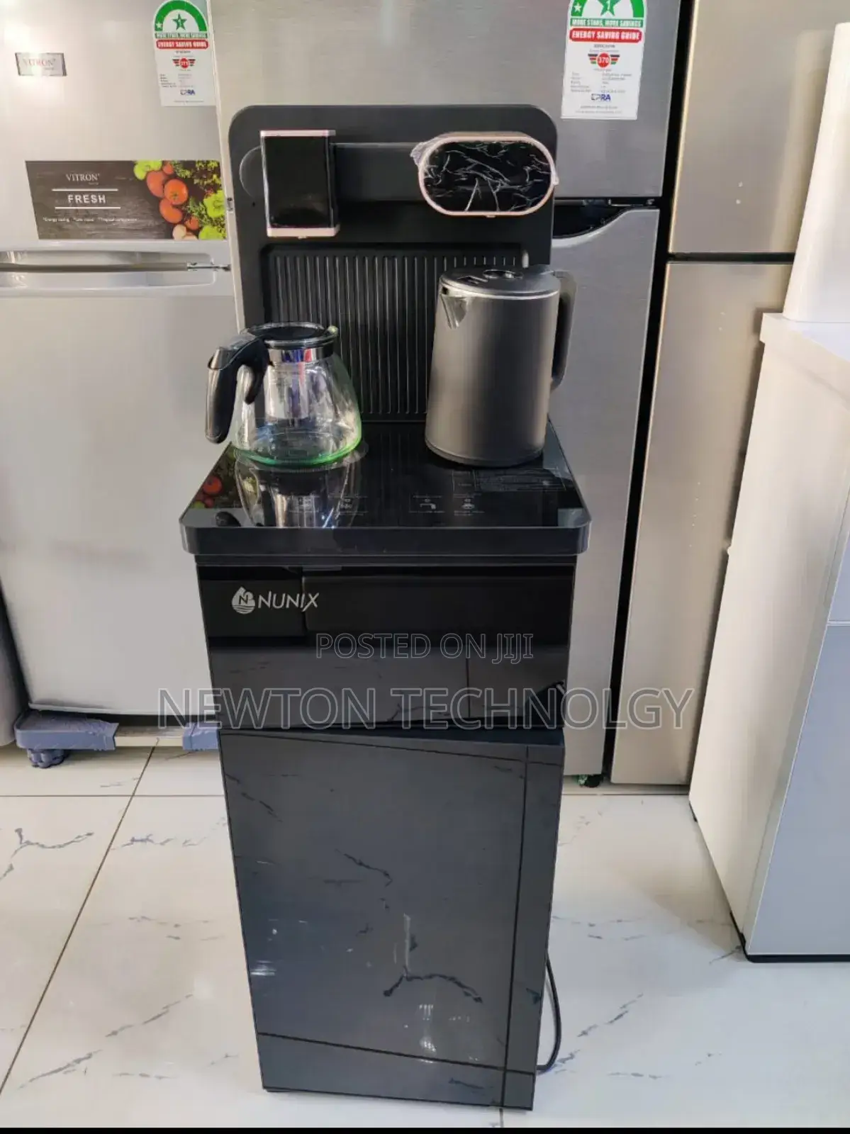 Black and Silver Dispenser