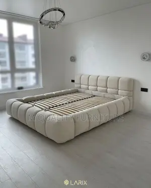 A Unique Rounded Padded Designed Bed