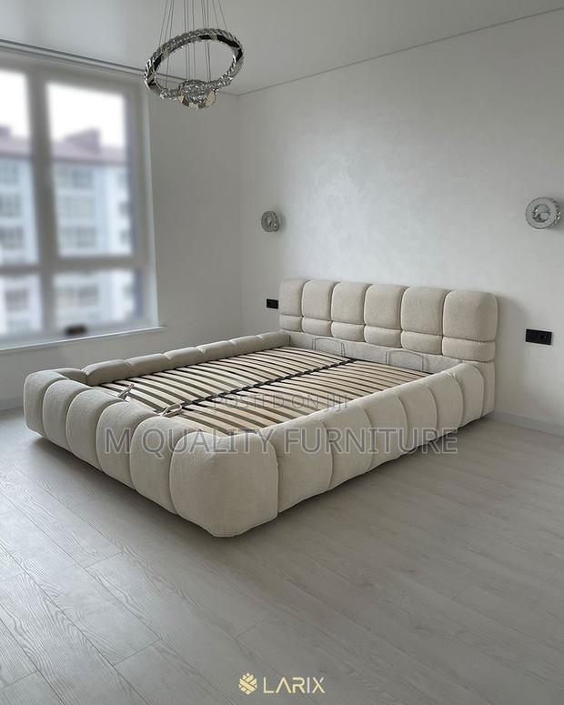 A Unique Rounded Padded Designed Bed