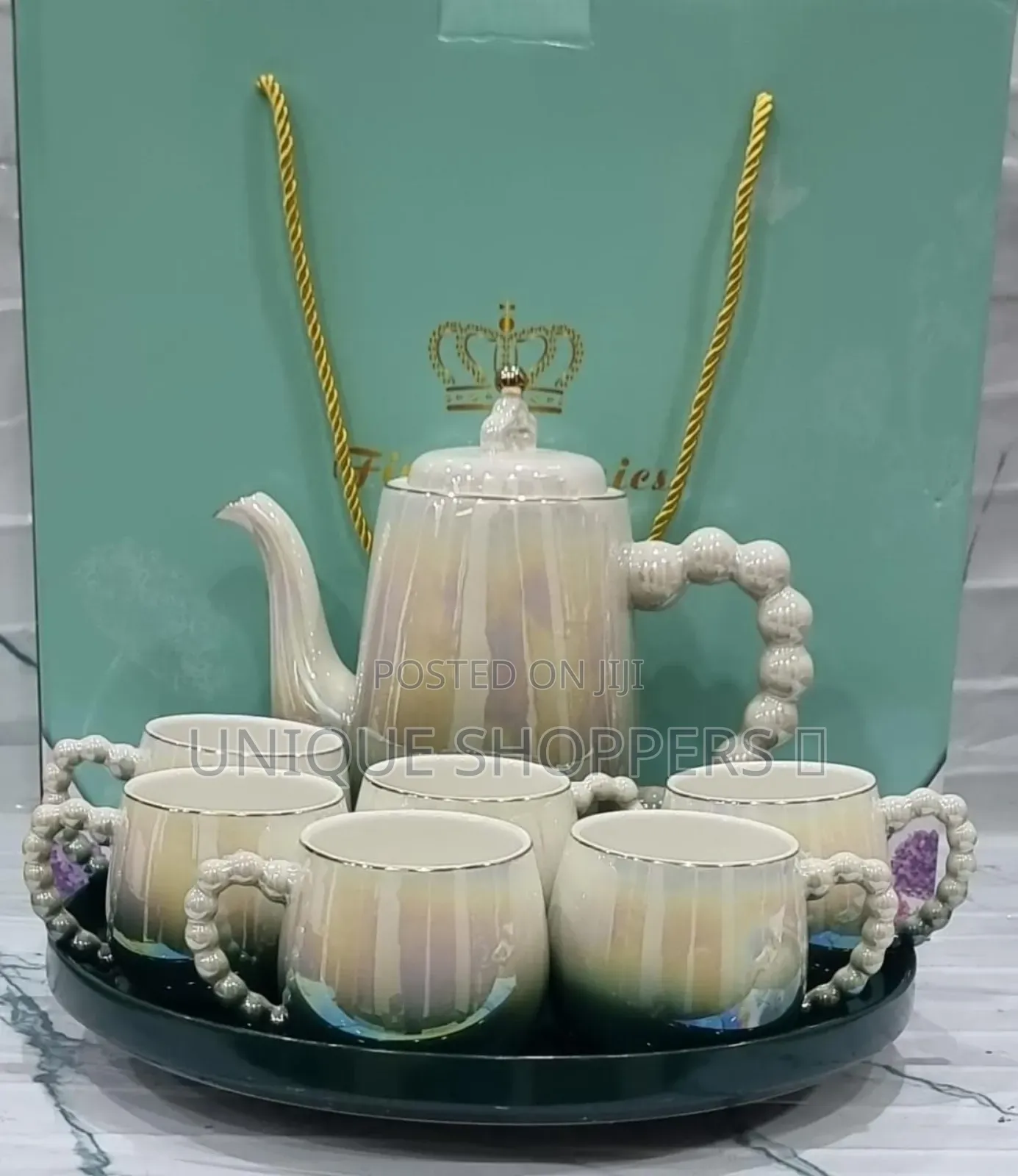 Fine Ceramic 8pc Rotating Tray Tea Set With 6 Cups and Kettle Now