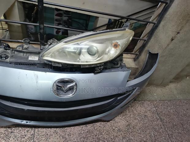 Mazda Primacy Nosecut Zenon