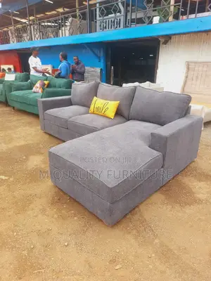 A Sofa With Extended Chaise Section