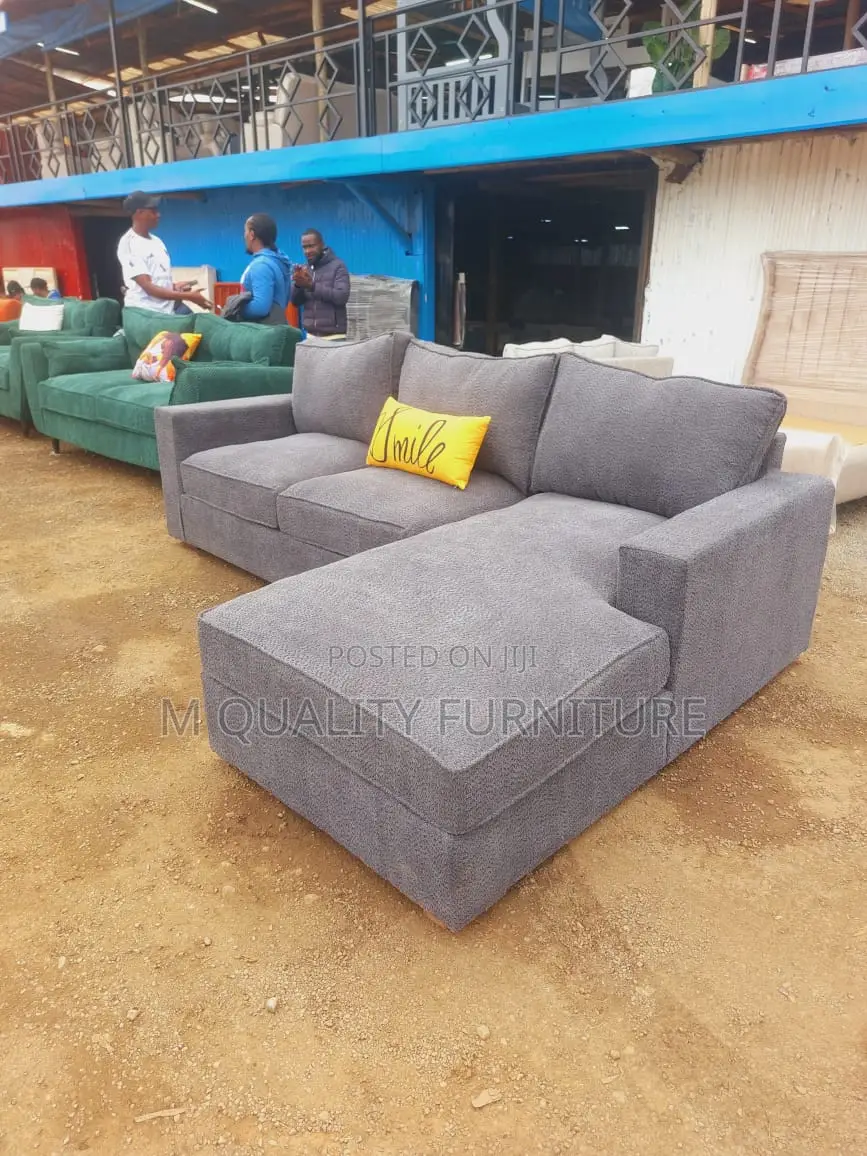 A Sofa With Extended Chaise Section