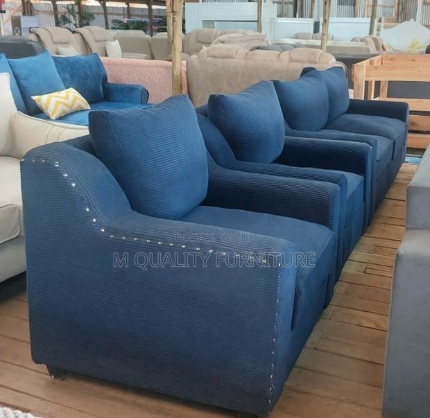 A Blue Sofa Serving as a Bold Centerpiece