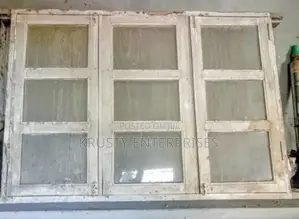 Wooden Window Frames With Glass Shutters
