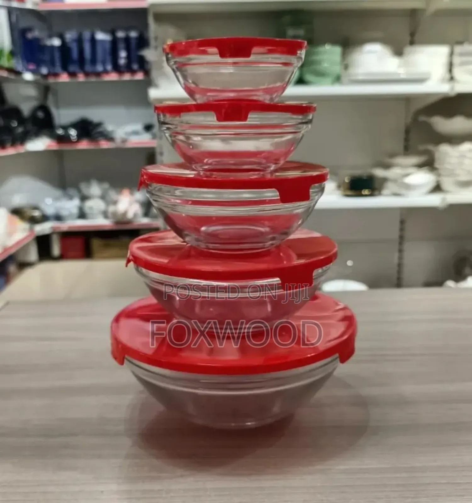 A Set of Glass Storage Bowls With Lids