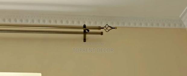 Style That Stretches to Fit Your Life Gold Adjustable Curtain Rods