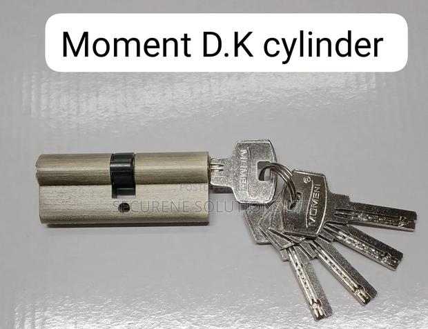 Moment D.K Cylinder" Door Lock With Its Corresponding Keys.