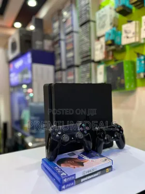 Ps4 Slim Two Controllers And Two Games.