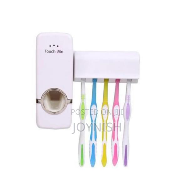 Tooth Paste Dispenser