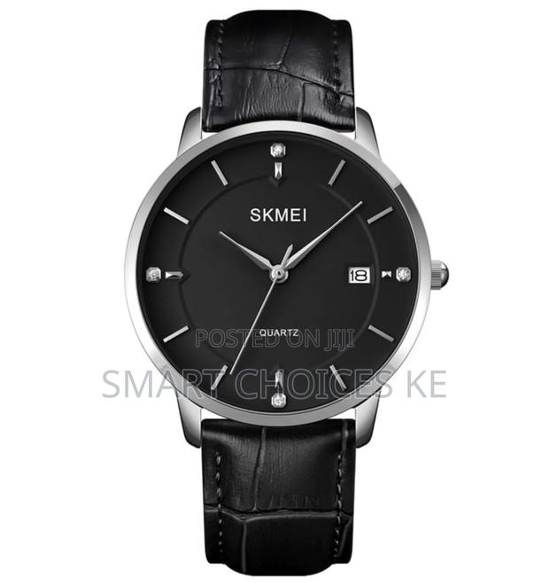 Skmei Unisex
 Leather Strap
 Stainless Steel Face