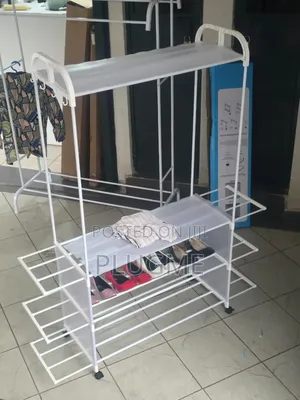 Modern Clothes Rack With 3 Metal Shelves