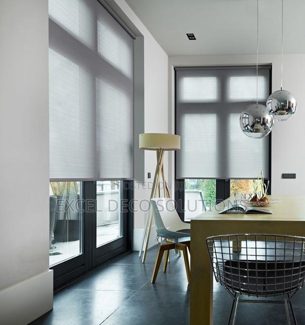 Energy-Saving Sunscreen Roller Blinds – Beat the Heat