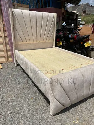Compact Upholstered 5 by 6 Bed