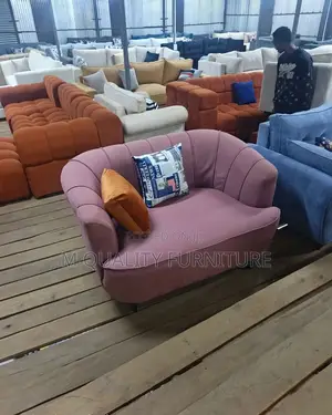 A Cozy Armchair Sofa With Plush Cushioning