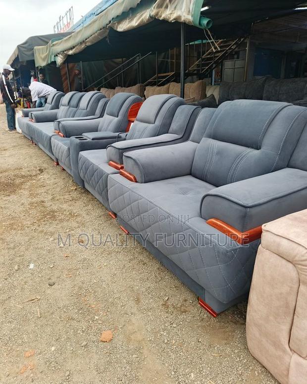 This Sofa Features Soft Fabric Upholstery - main view