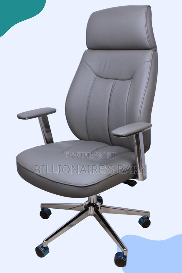 Grayish Leather Chair With High Back Chrome Base