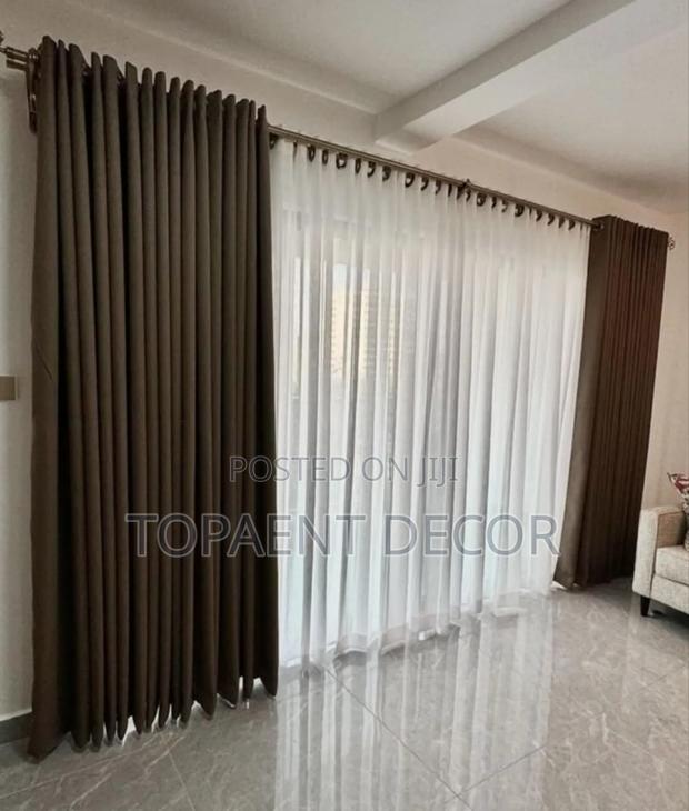 When Coziness Meets Elegance Brown Window Curtains and White Sheers