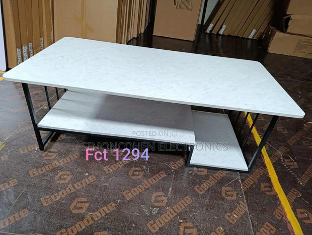 White Marble Coffee Table With Black Stand - main view