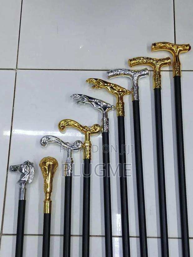 Stylish Pimped Walking Sticks 
With Sword 
Golden/Silver Handles